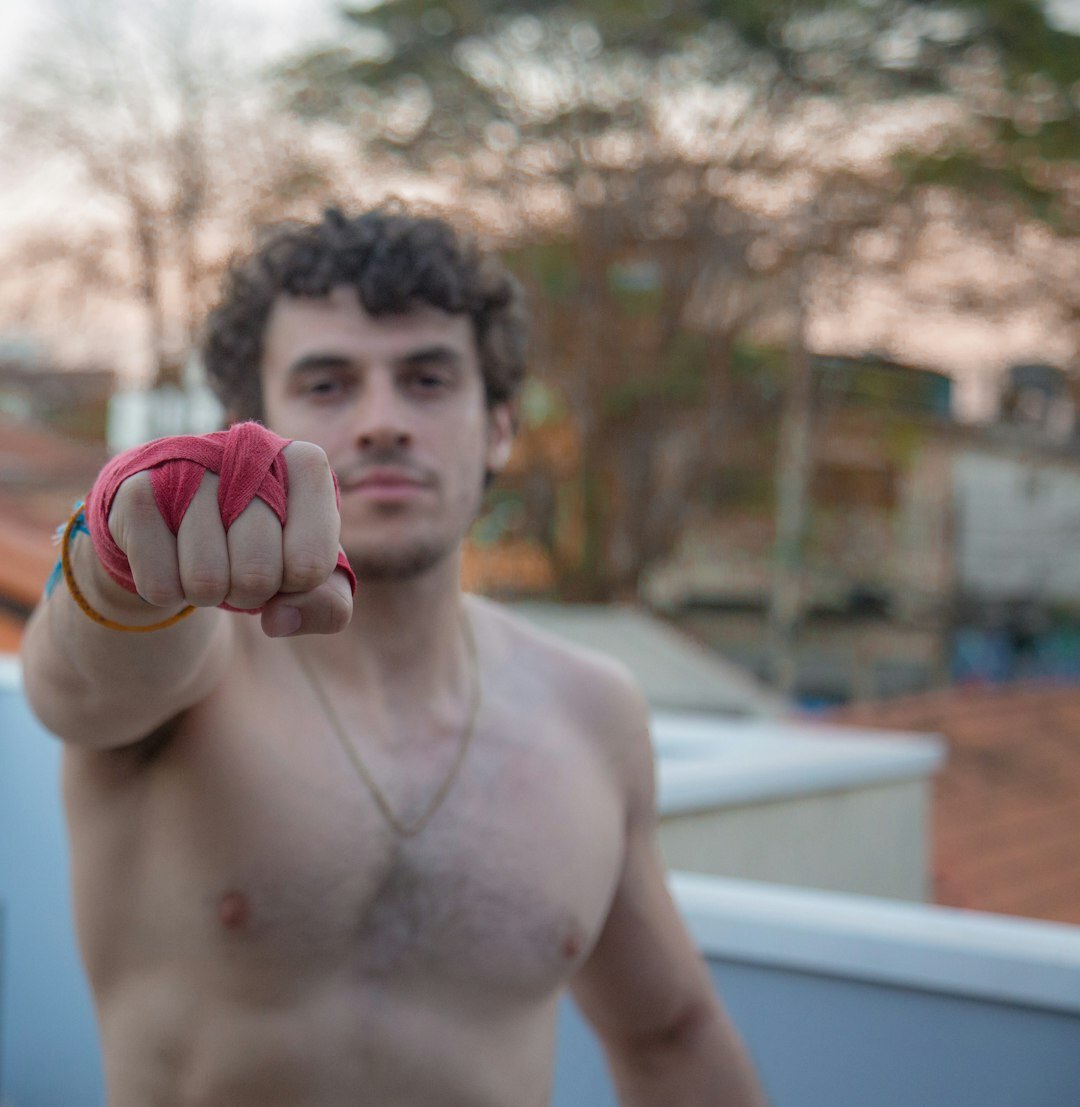 Portrait of a Brazilian man in his thirties with short curly hair