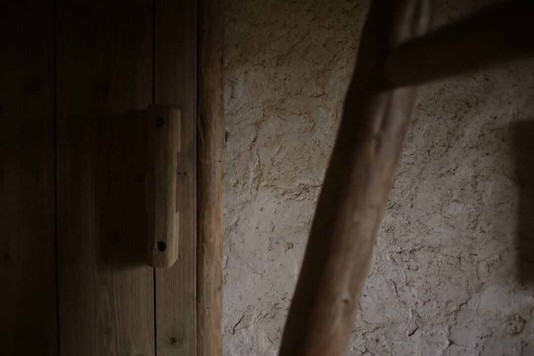 Close-up of natural linen, oak wood and travertine stone textures